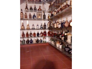 Coleção de garrafas de Whisky